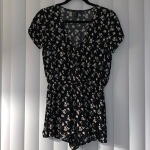 Black and white romper with flower patterns